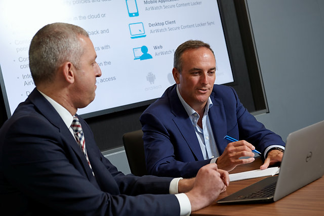 Editorial portrait photograph of Scott Dodds and work colleague, VMware VP Channel & Alliances EMEA